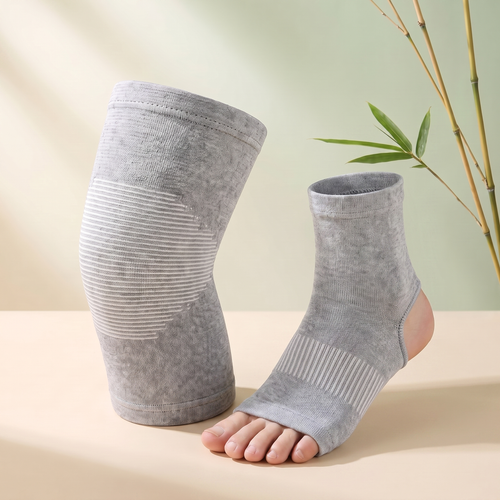 Bambu knee sleeve and ankle sleeve recovery bundle on studio pedestal
